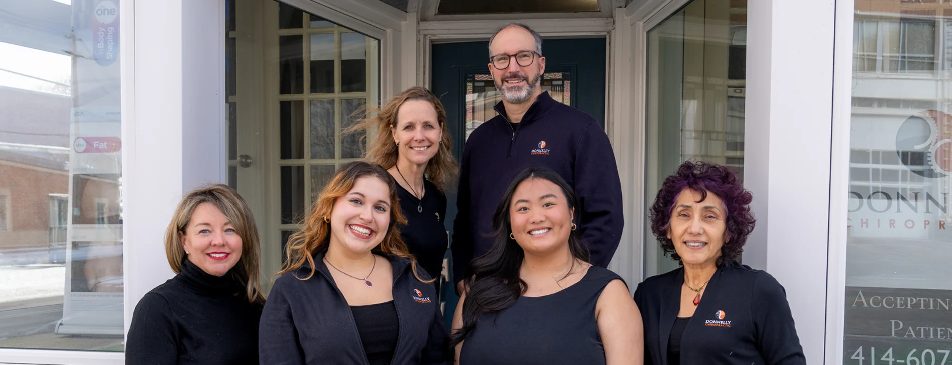 Chiropractor West Allis WI Mary Donnelly ANd Kevin Donnelly With Team